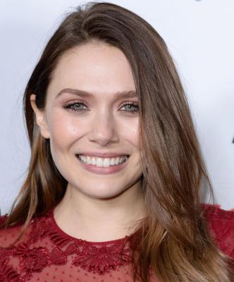 Elizabeth Olsen in a see through dress